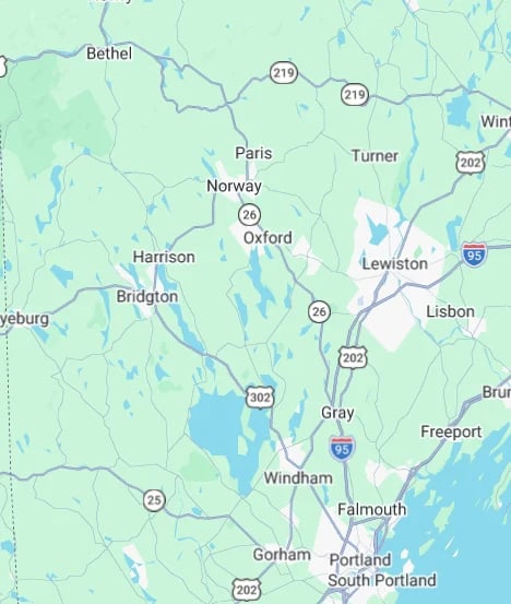 Map of Oxford, Maine showing surrounding towns, highways, and geographic features with state routes 26, 202, 219, and Interstate 95 marked